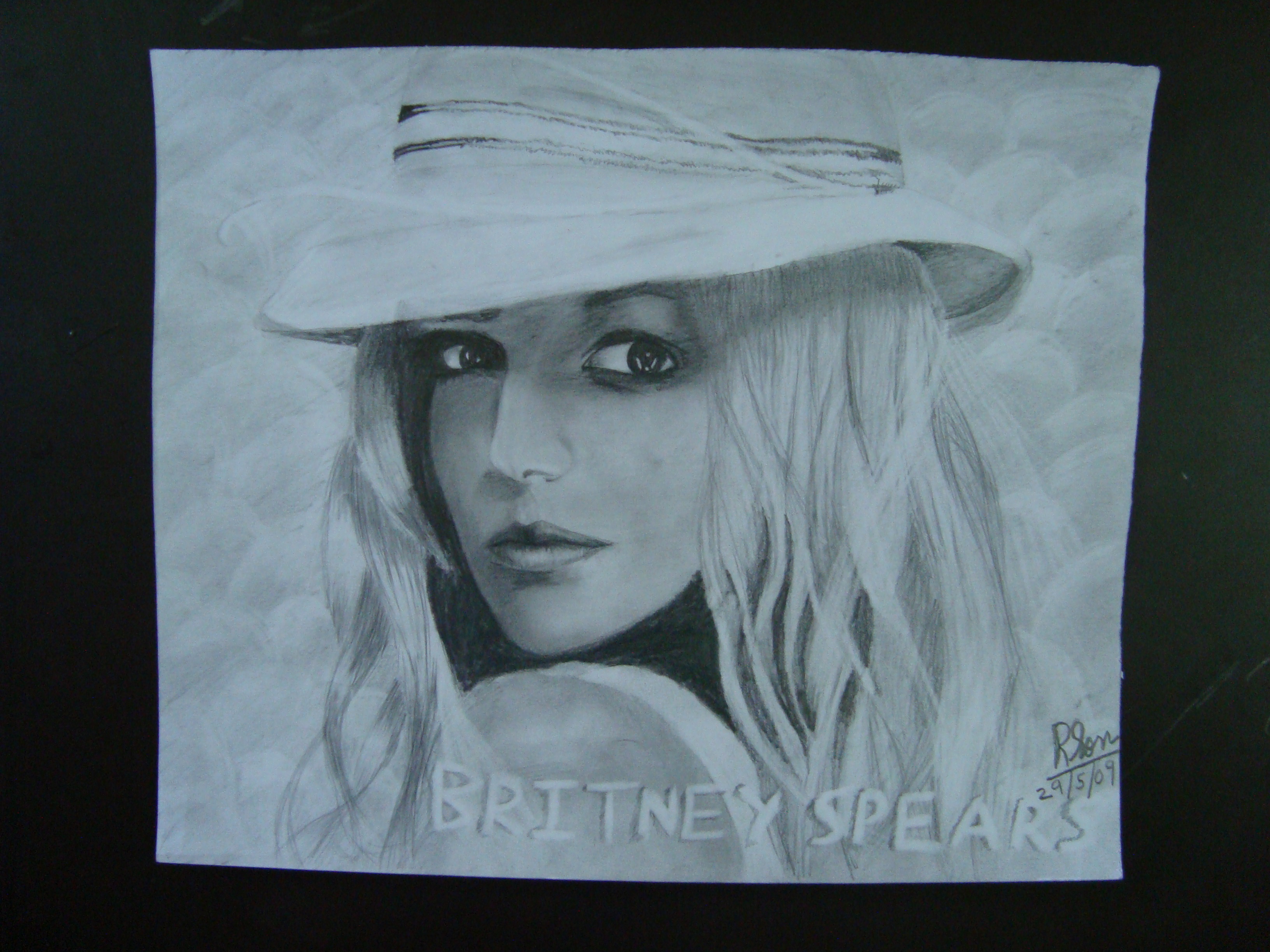 <span  class="uc_style_uc_tiles_grid_image_elementor_uc_items_attribute_title" style="color:#ffffff;">Britney spears</span>